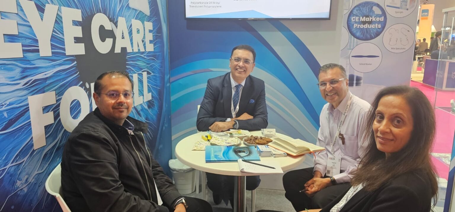 Two people meet with Wizcure and Ophtechnics Owner